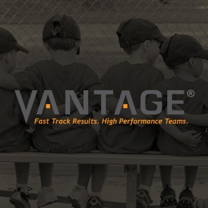 black and white photo of kids in a baseball team with gray orange vantage logo