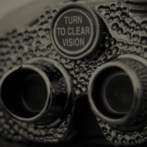 black and white photo of vintage binocular