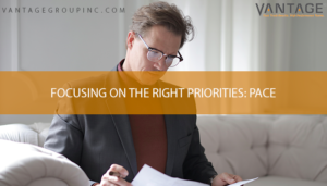 businessman working with text reading focusing on the right priorities: pace