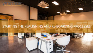 big office with text reading starting the realigning and re-boarding processes