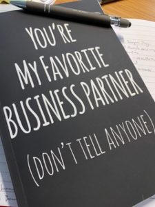 black cover with white text reading you're my favorite business partner