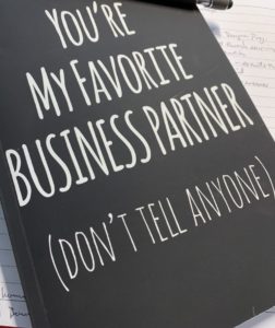 black cover with white text reading you're my favorite business partner